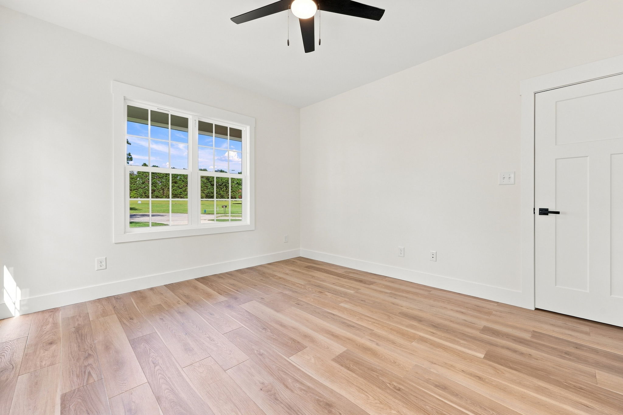 Quiet Secondary Bedroom at The Eliora by Covenant Construction Group
