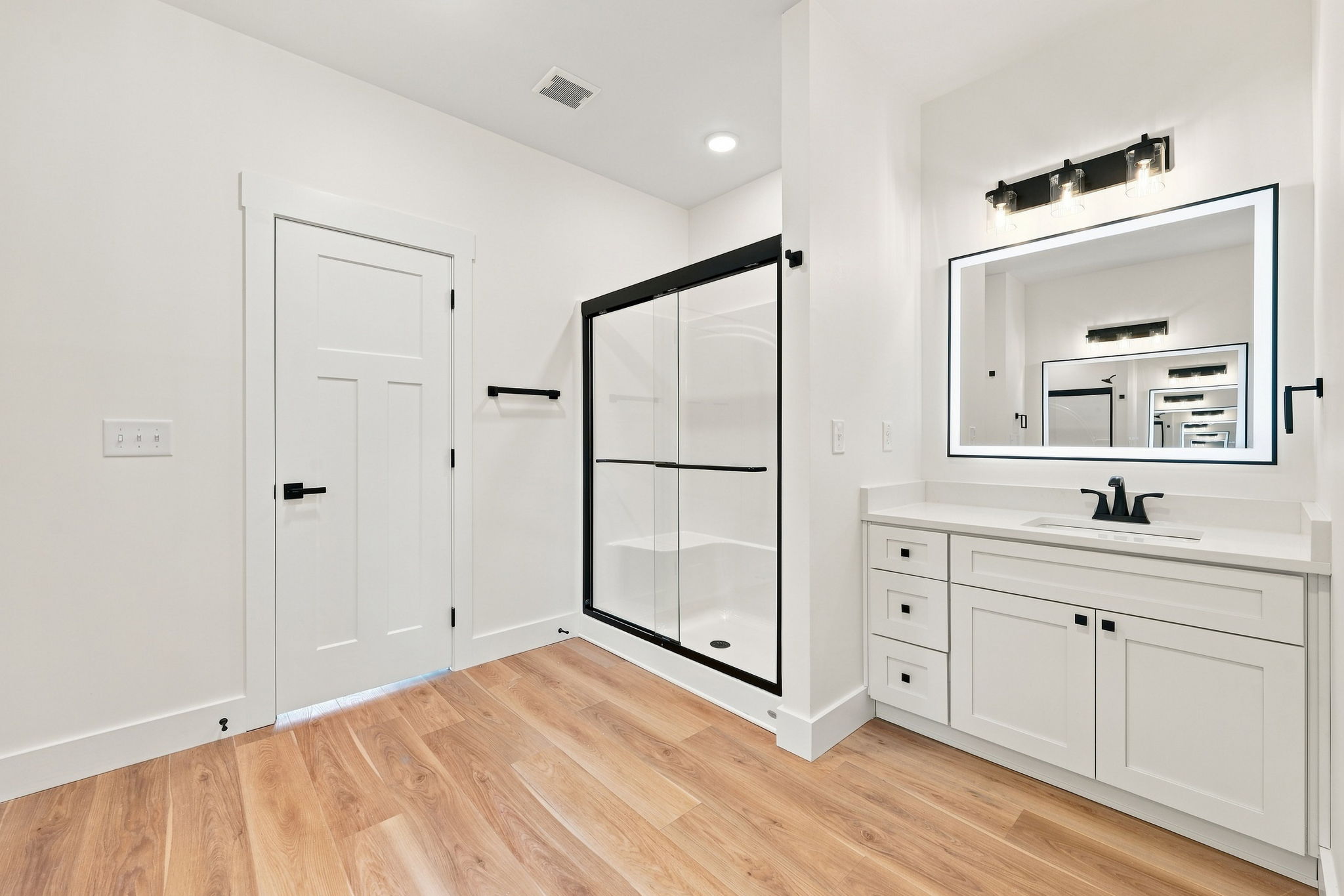 Walk-In Shower Suite at The Eliora by Covenant Construction Group