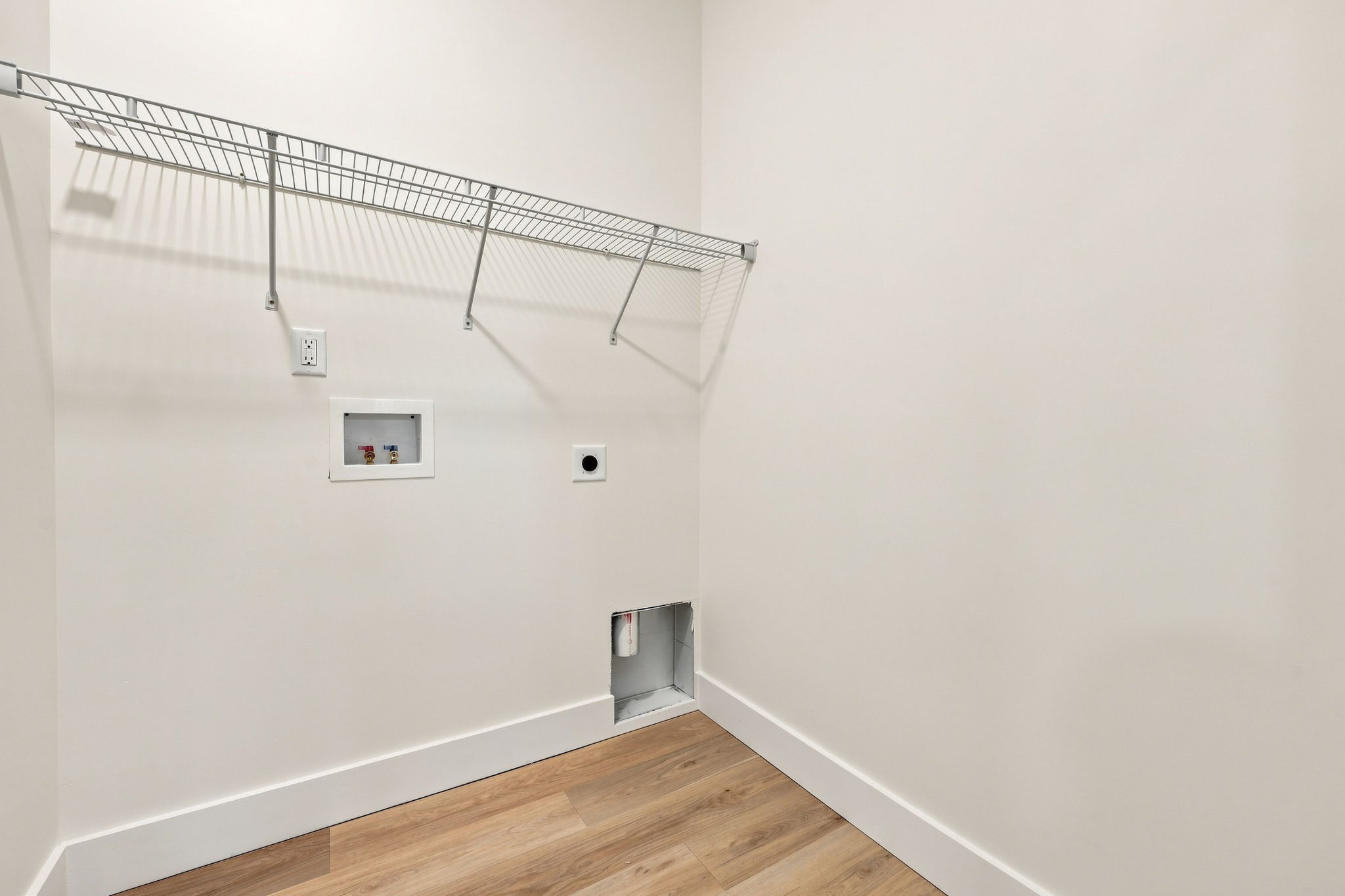 Dedicated Laundry Room at The Eliora by Covenant Construction Group