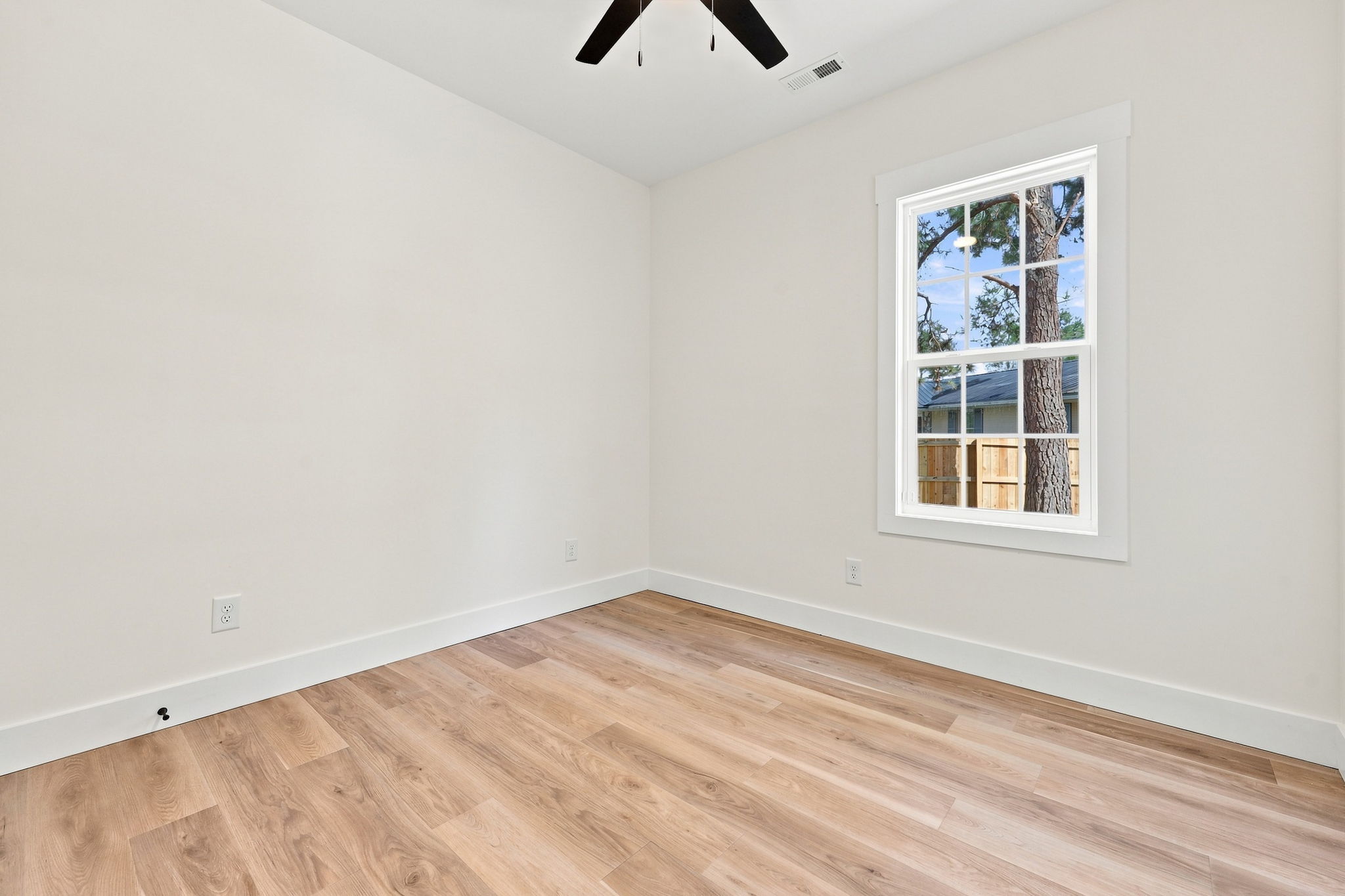 Bright Guest Bedroom at The Eliora by Covenant Construction Group