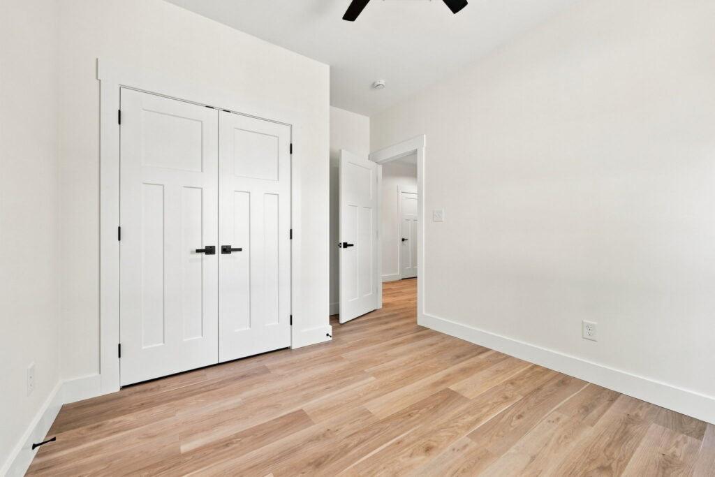 Bedroom 3—Closet View — Opens to the main hall and includes a broad reach-in closet