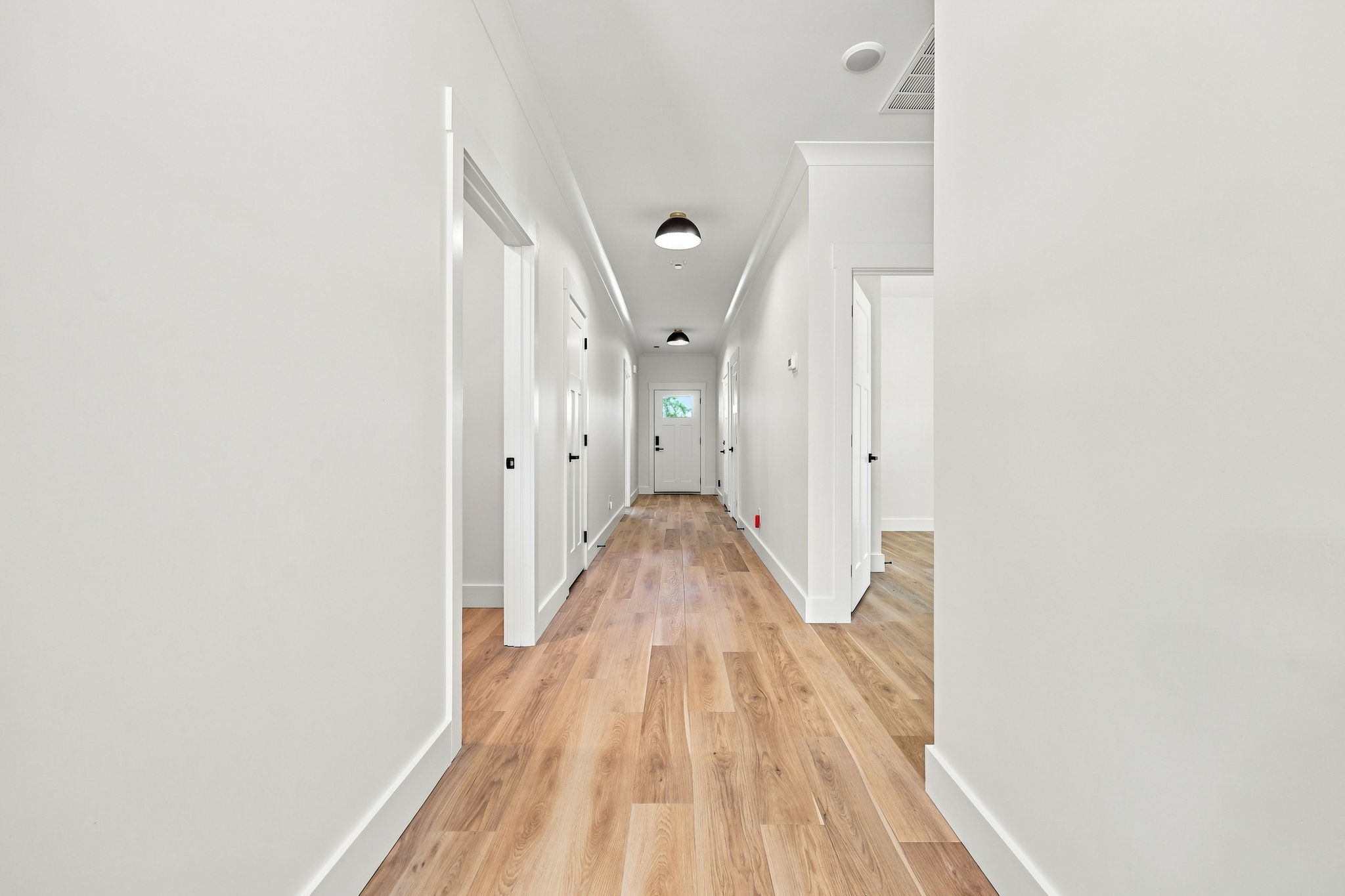 Long Interior Hall at The Eliora by Covenant Construction Group