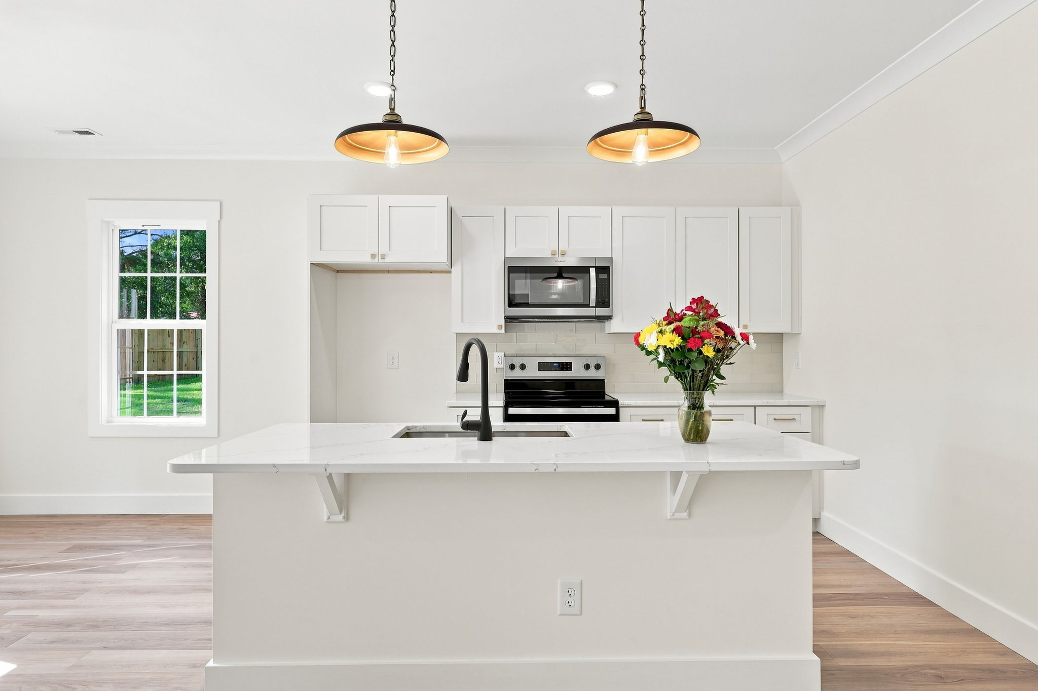 Bright, Functional Kitchen at The Eliora by Covenant Construction Group