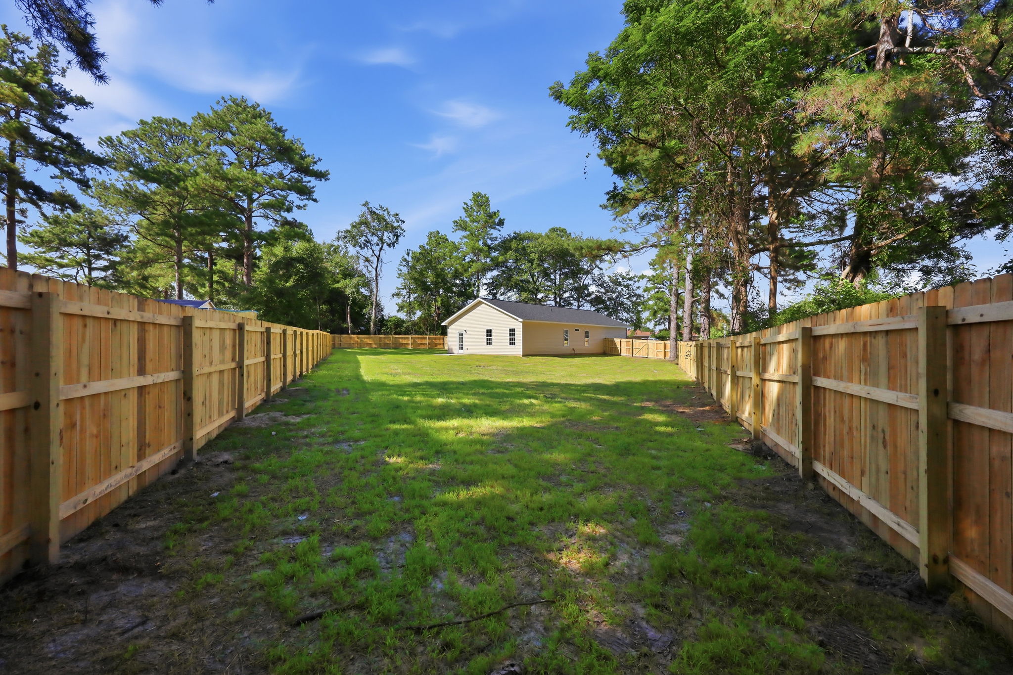 Deep Fenced Backyard at The Eliora by Covenant Construction Group