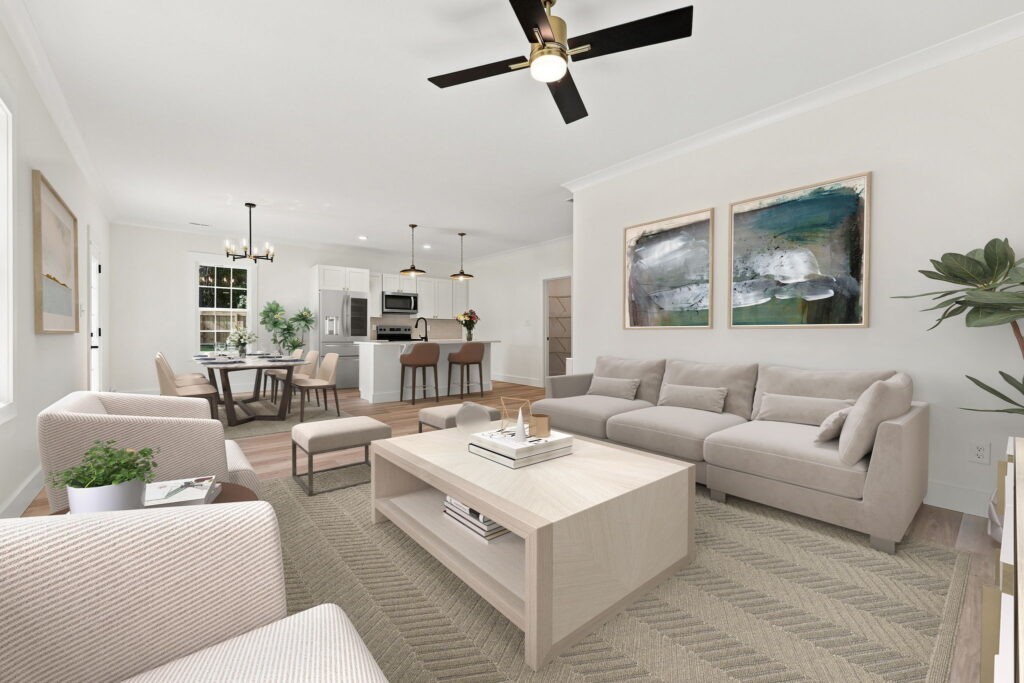 Staged Main Level — Digitally furnished living and dining zones show the flow across the main level